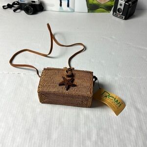 Dewi handwoven shoulder/ crossbody wee one handbag.